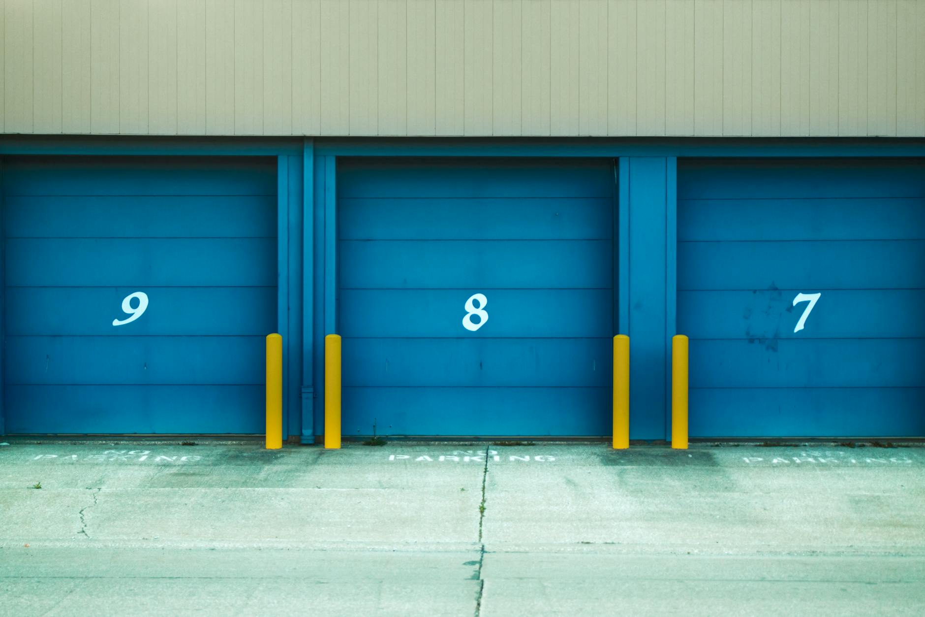 blue garage with number written