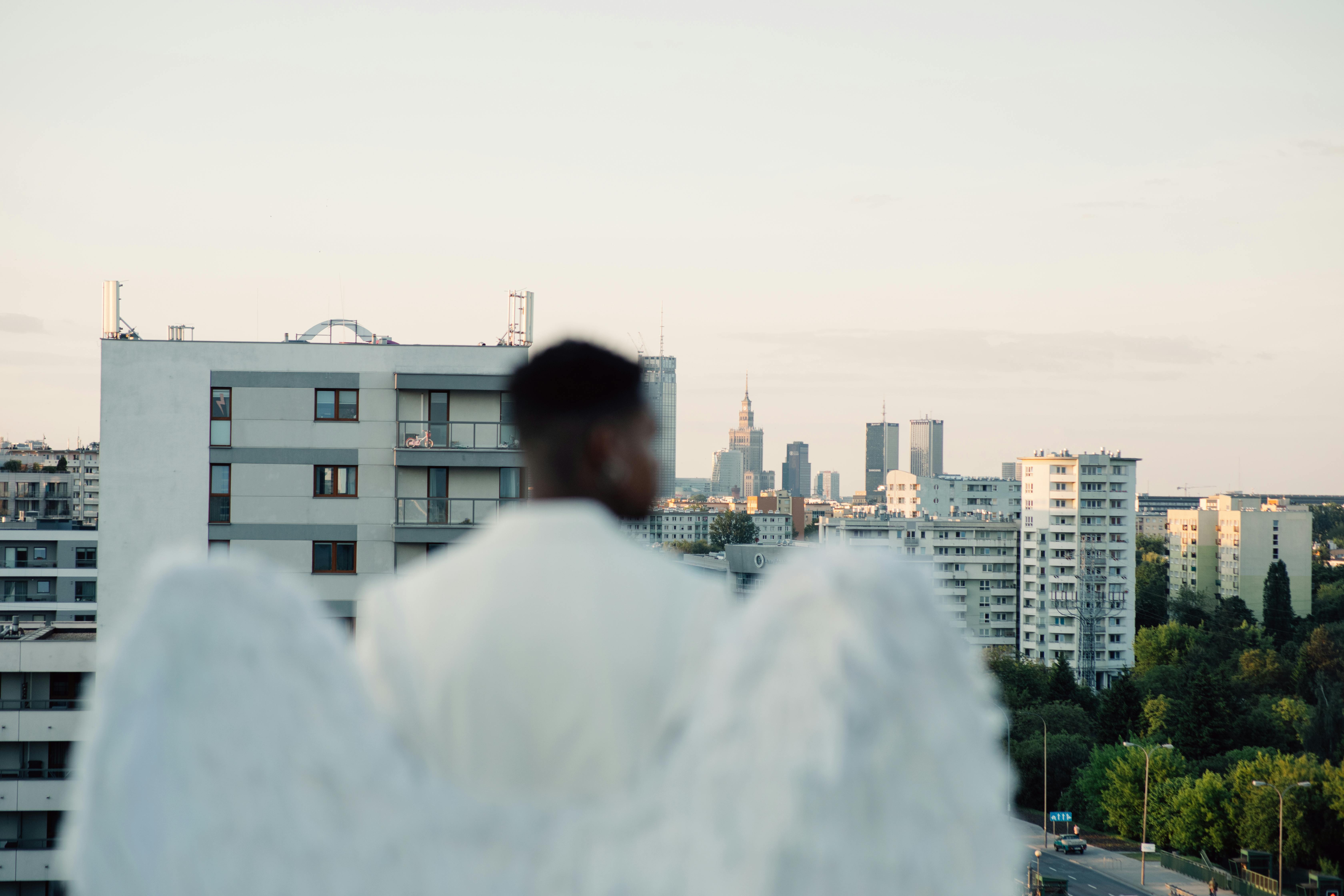 back view of a man wearing an angel costume