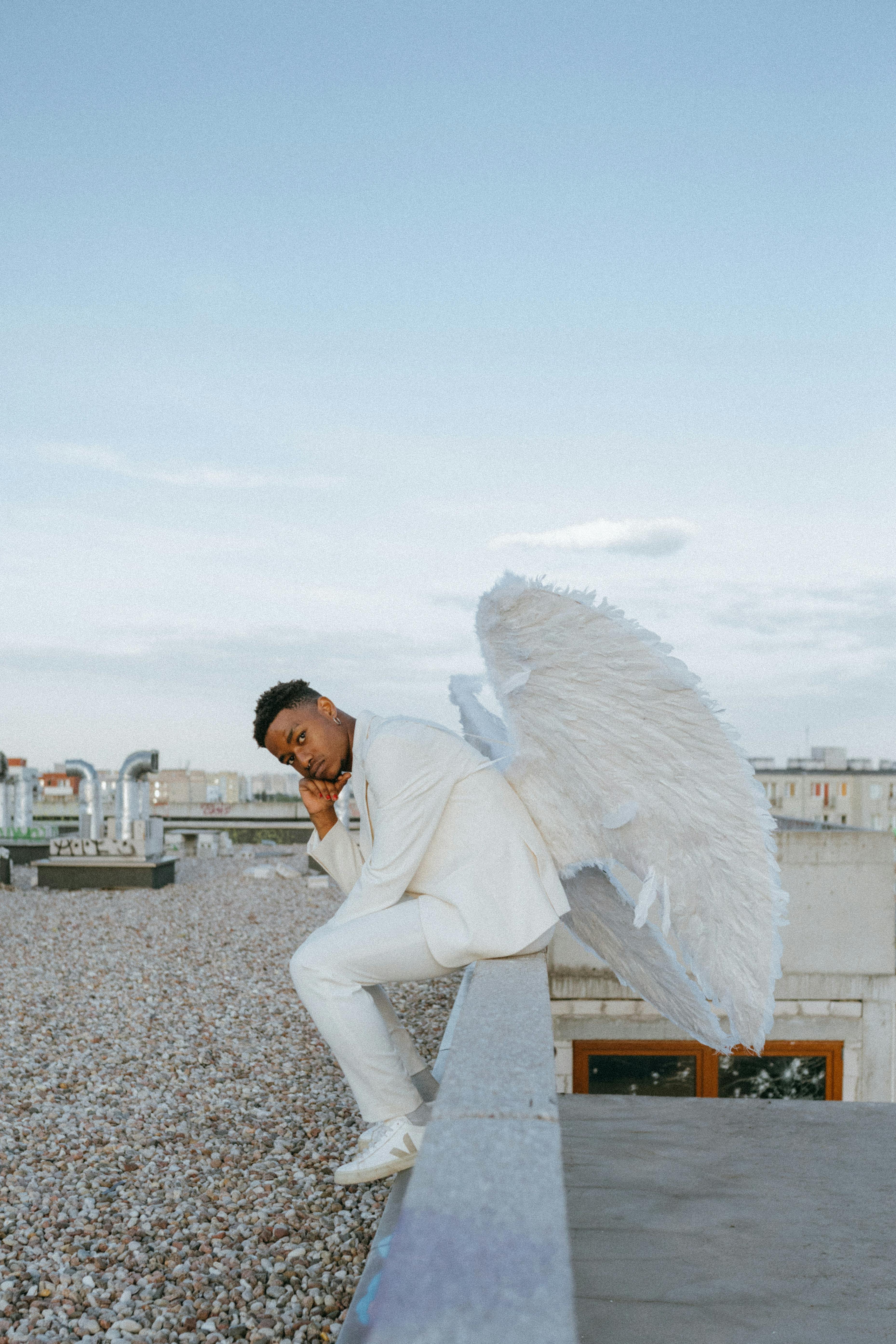 A Man Wearing an Angel Costume · Free Stock Photo