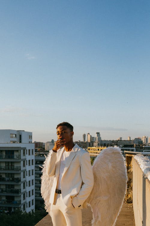 An Angel Standing on the Edge of the Rooftop