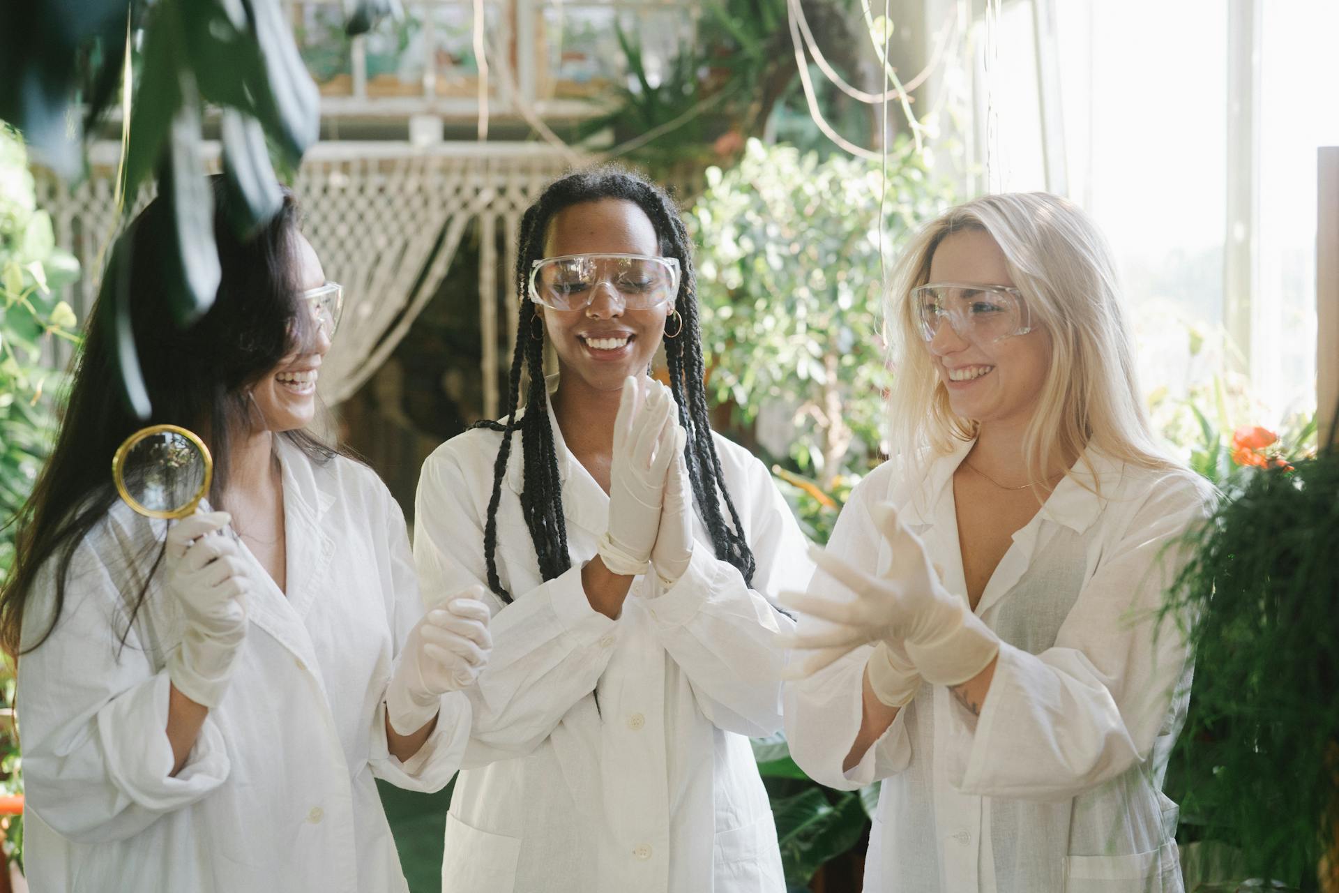 Women in White Lab Gown Smiling