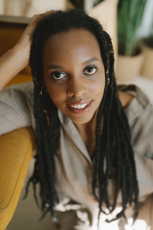 Close Up Photo of a Woman with Braided Hair