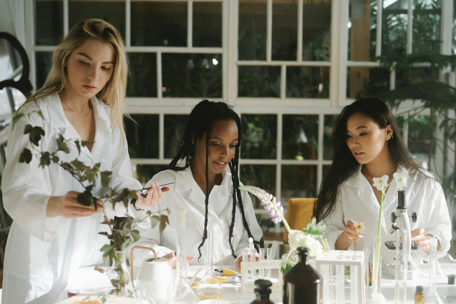 https://www.pexels.com/photo/group-of-female-botanist-conducting-a-study-8514937/