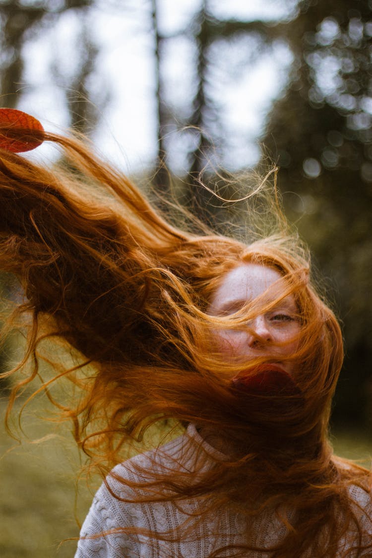 Woman Doing A Hair Flip