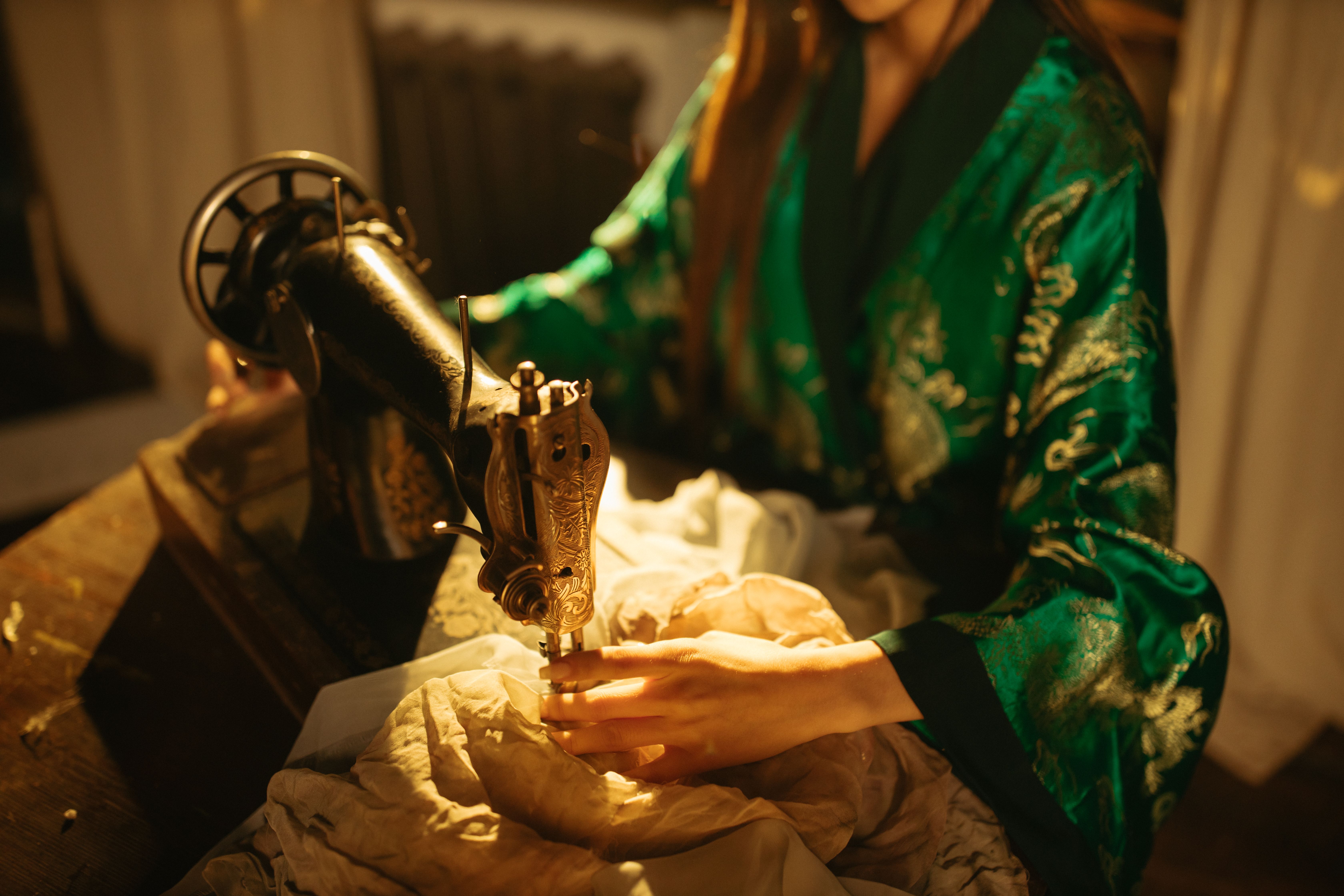 A sophisticated luxury haute couture atelier showcasing AI-enabled digital customization and bespoke craftsmanship.