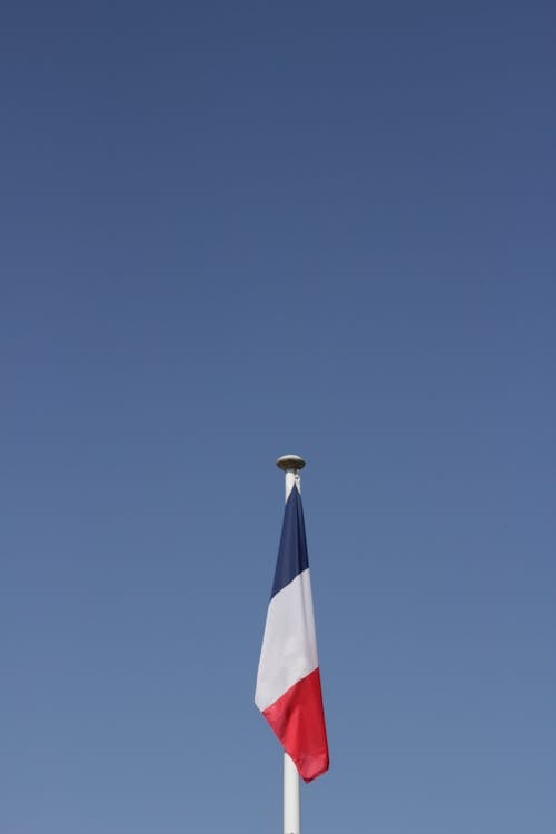 Kostnadsfria Kostnadsfri bild av blå himmel, flagga, flaggstång Stock foto