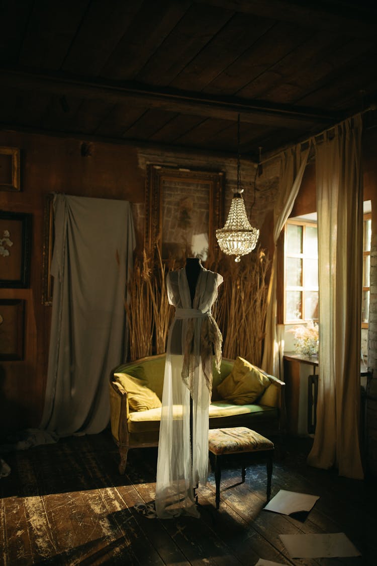 See-through Dress Hanging On A Mannequin In A Room 