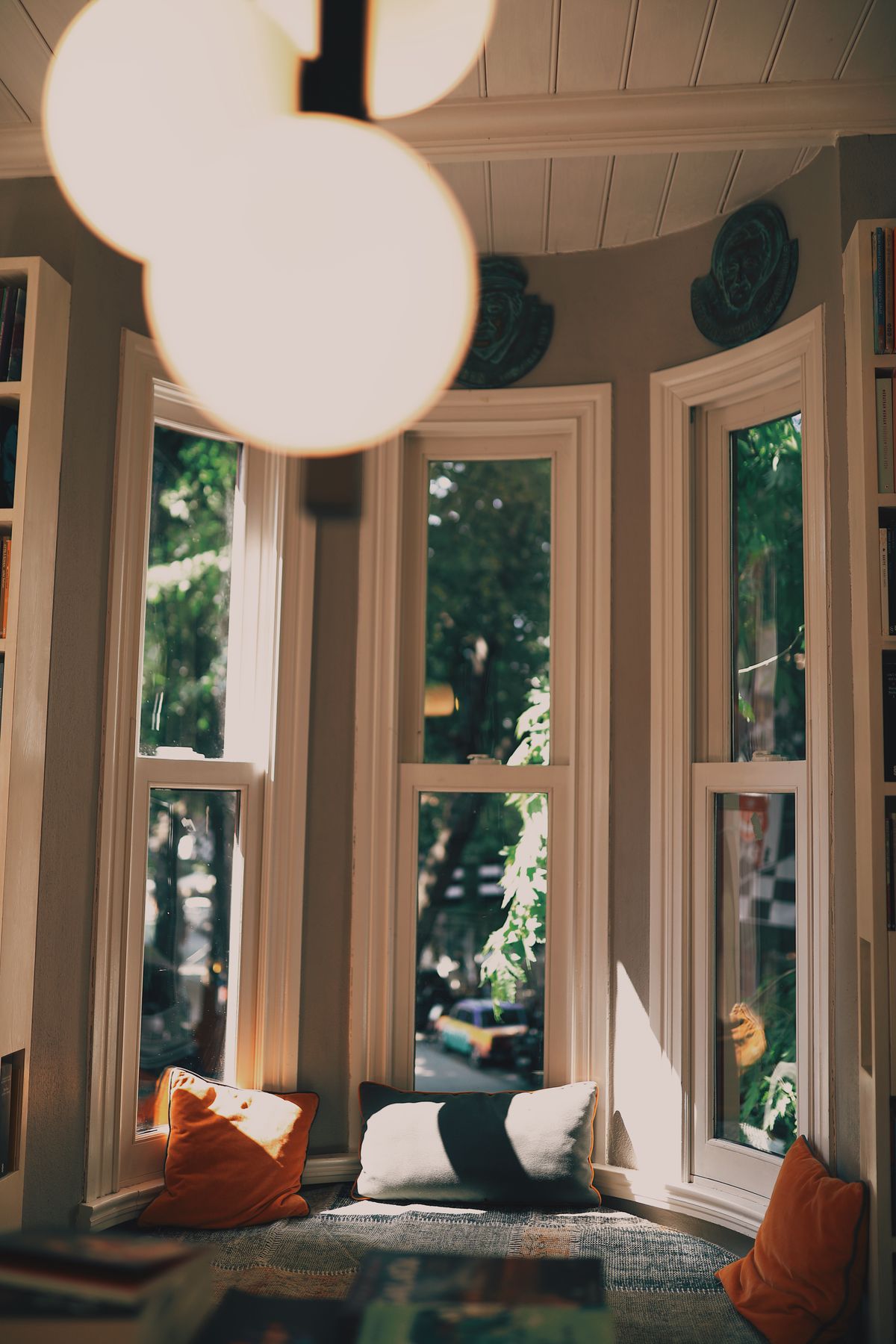 Custom window seat with cushions in a bay window
