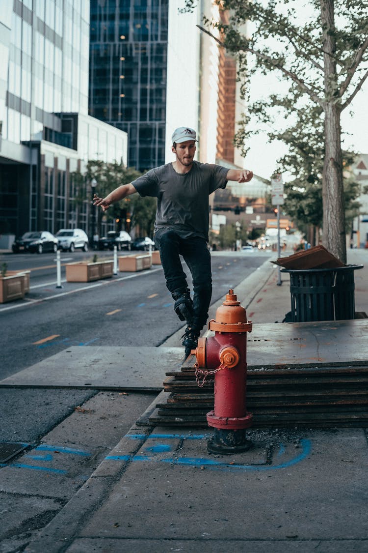 A Man Using Rollerblades In The Street