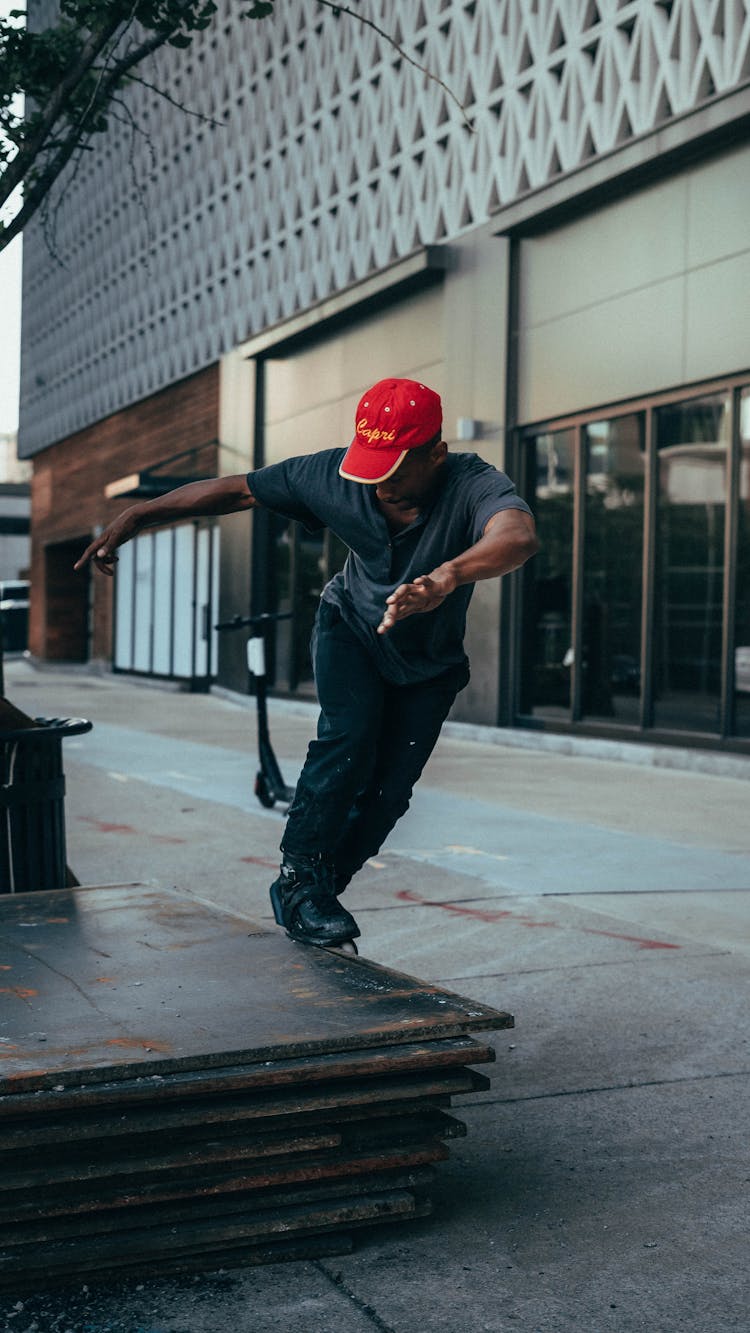 A Man Riding Rollerblades