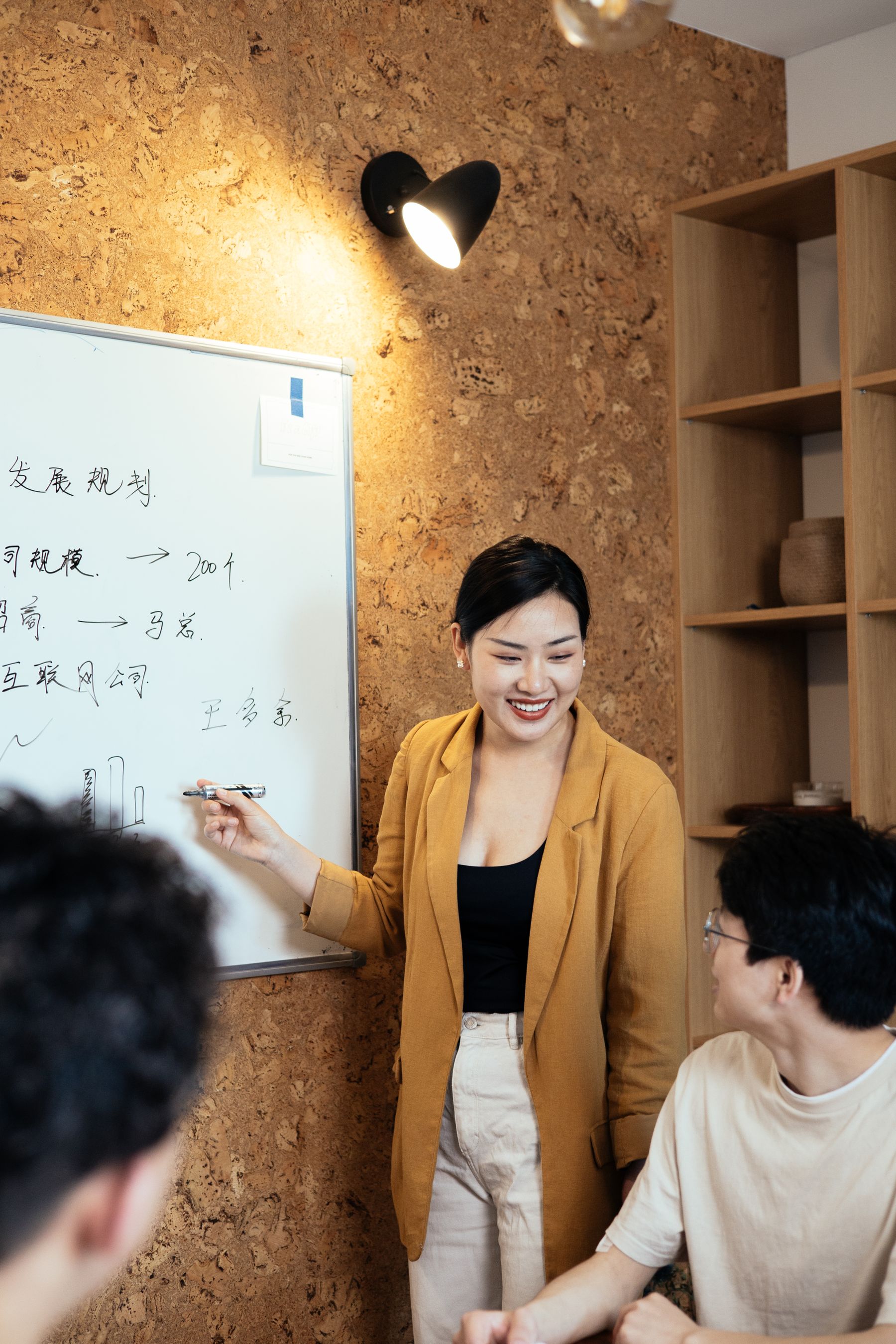 An analyst presenting research to colleagues
