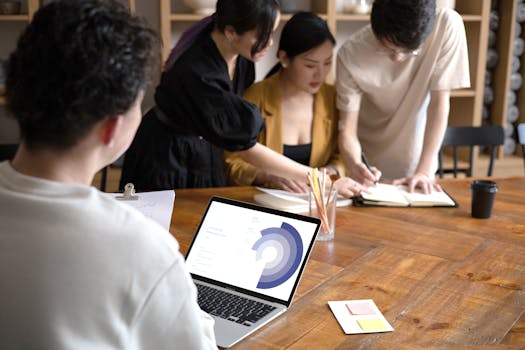 Team of professionals collaborating in a modern office setting.