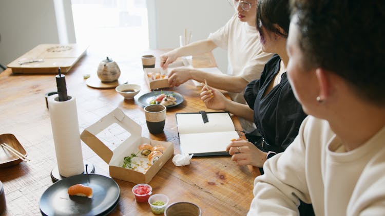 People Eating Japanese Food