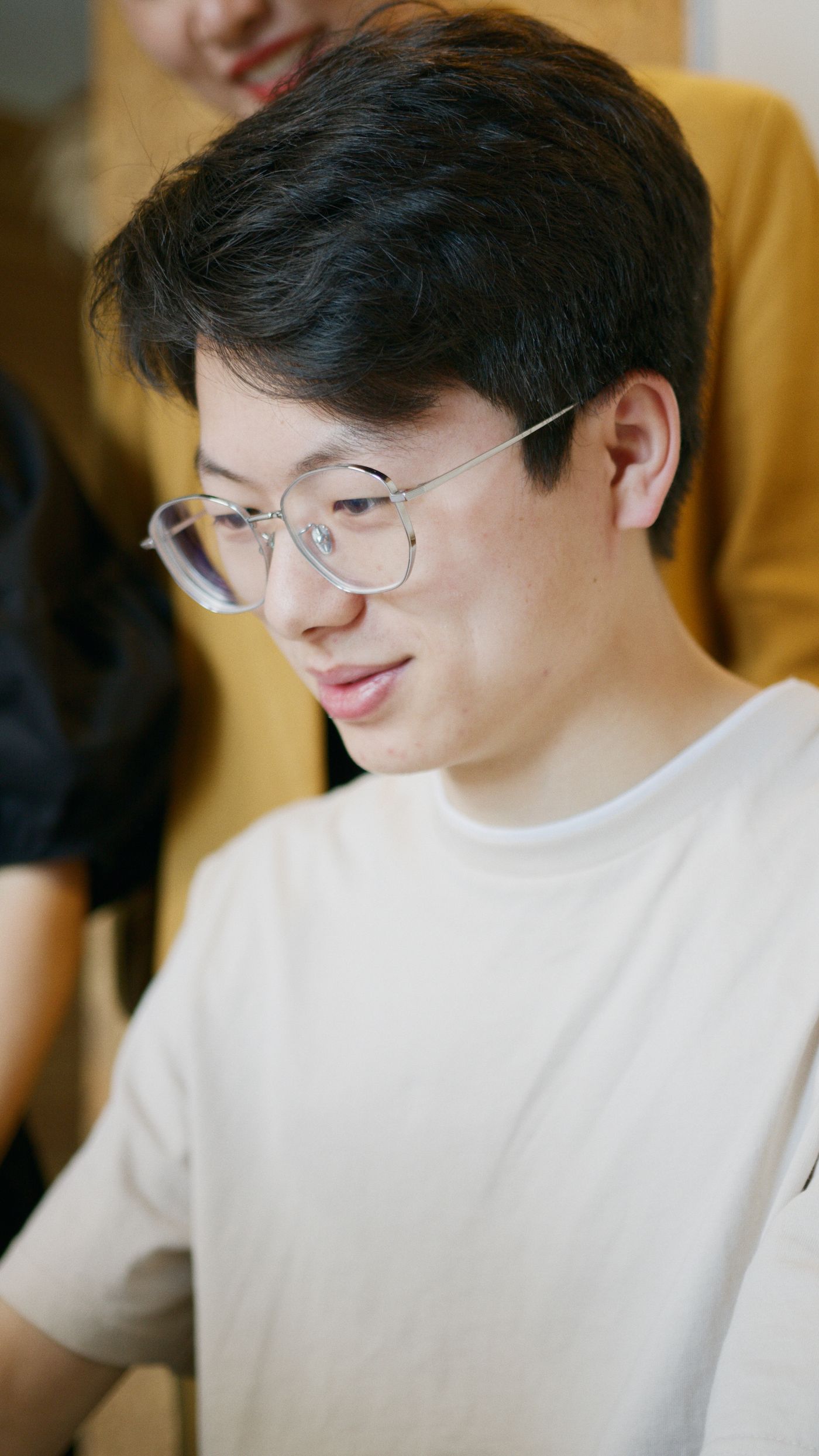 Customer wearing glasses in a work setting
