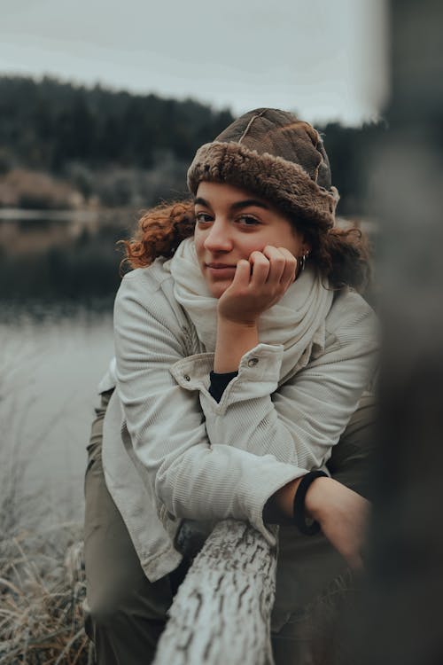 Woman Sitting near Water