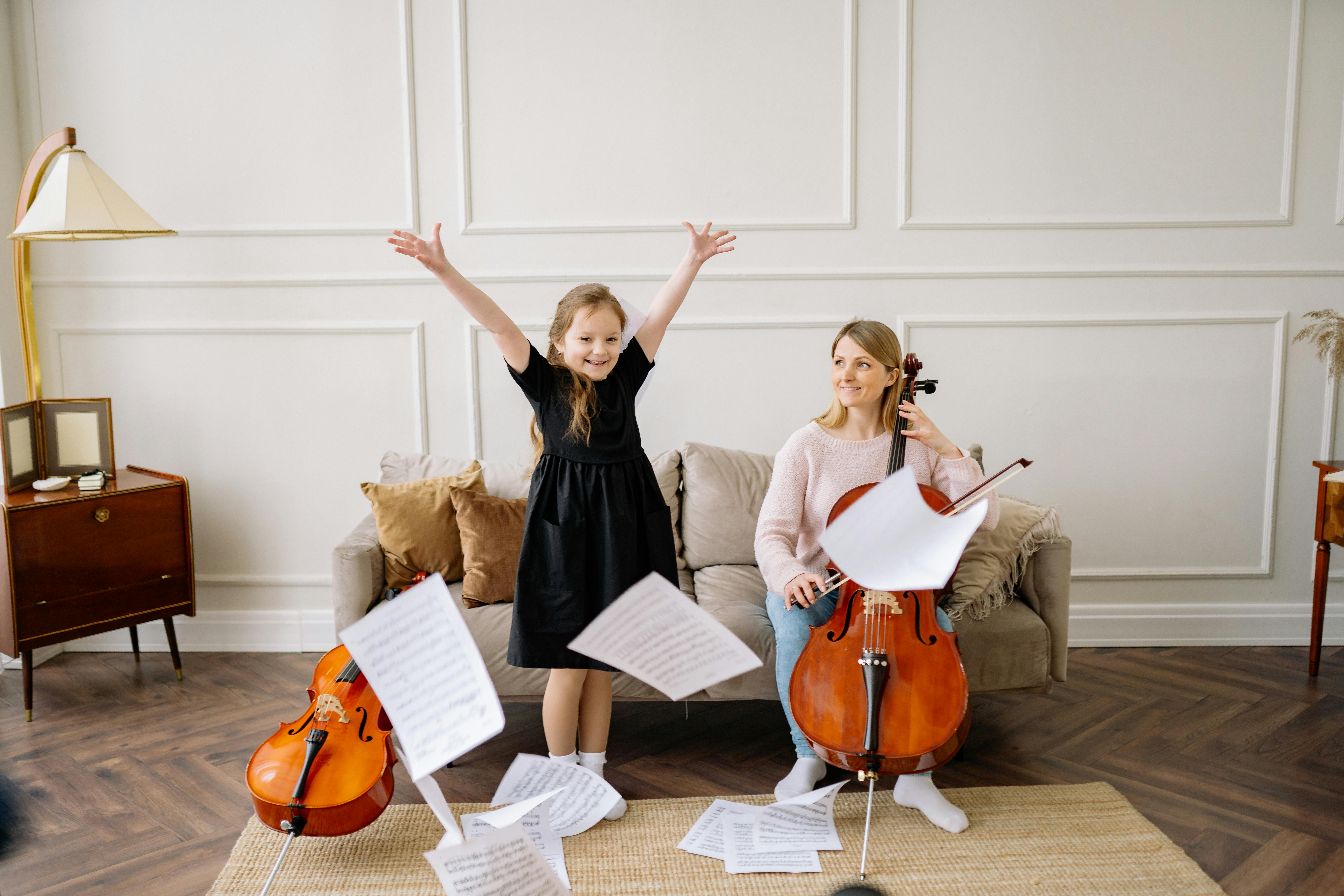 A Woman And A Girl Playing Cello Free Stock Photo   Pexels Photo 8519626 