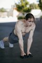 A Shirtless Man Working Out