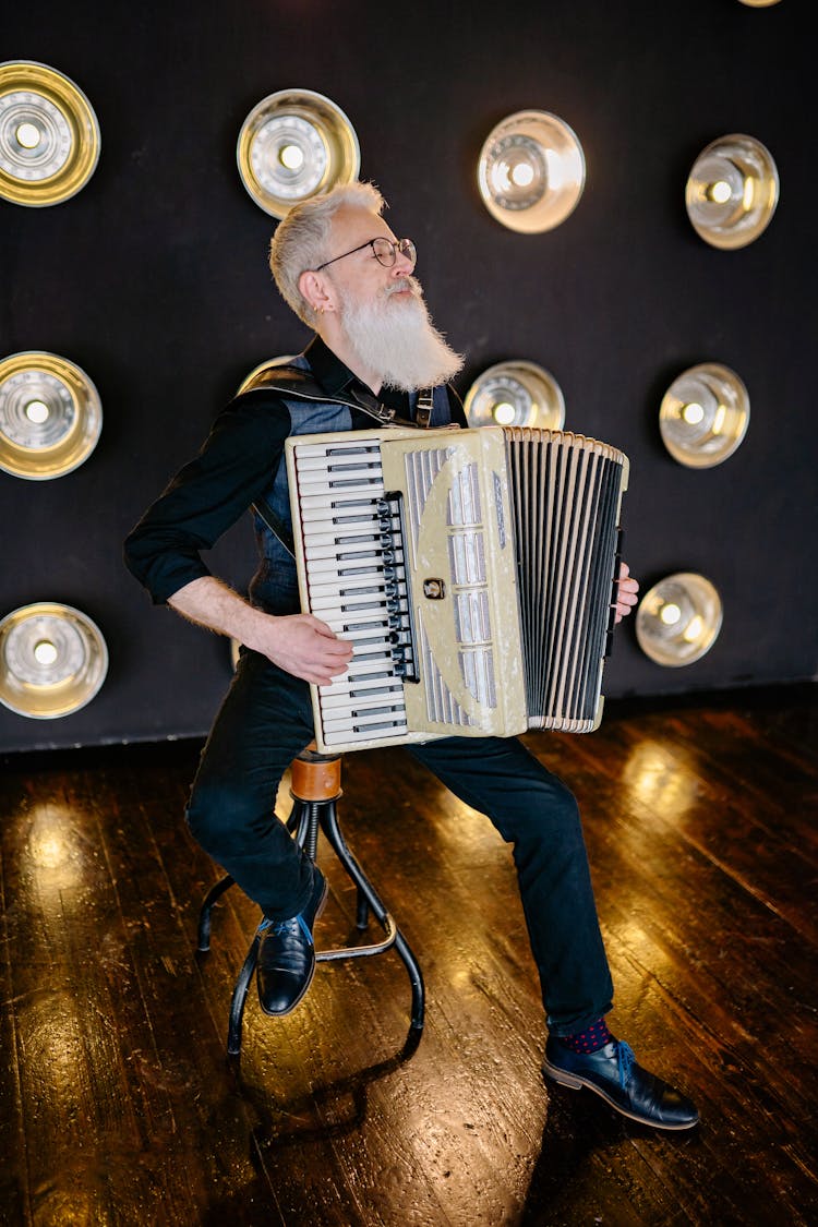 Bearded Man Playing Accordion