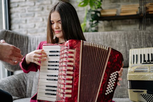 A Girl Playing an Accordion