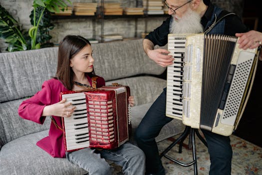 A young girl and an older man play accordions on a sofa, creating music together.