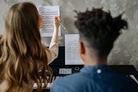 Music student practicing piano