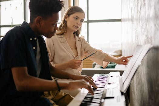 A teenager learning piano with a teacher at home, focusing on musical notes.