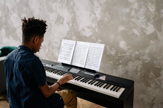 A Boy Sitting while Playing Piano