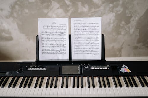 Music Sheet Standing on a Keyboard 