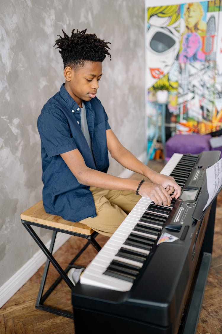 Boy Playing The Piano