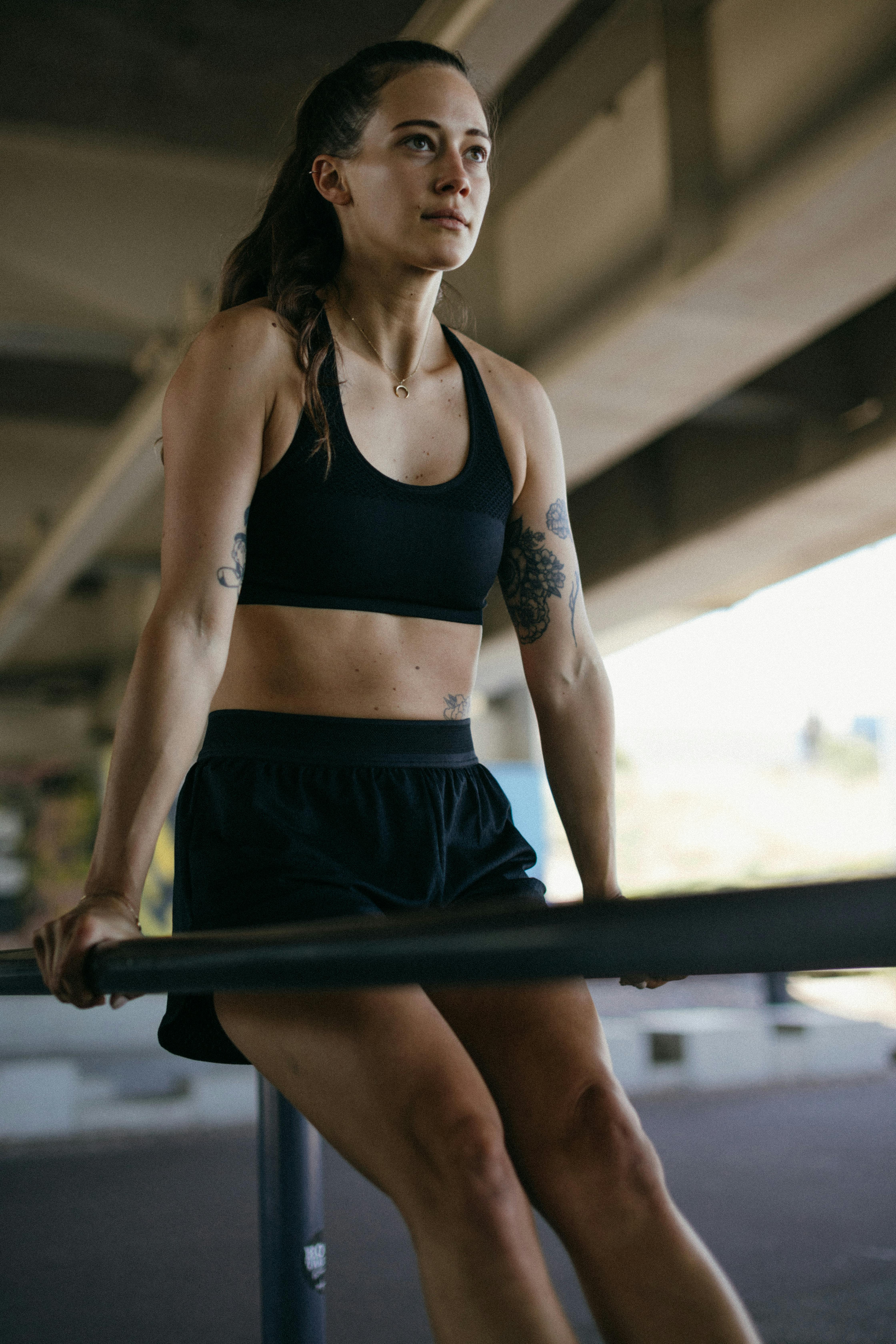 girl in sports bra and shorts