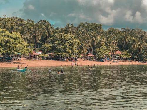 People on Beach on Tropics 