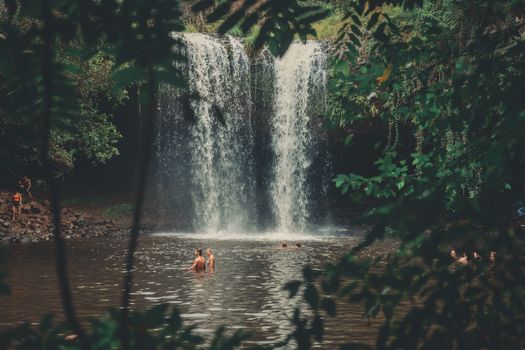 People in Water Falls