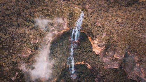 Free Aerial View of Waterfall in a Rainforest Stock Photo