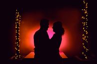 Silhouette of Man and Woman Kissing