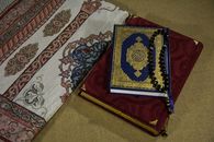 Close-Up Shot of Prayer Beads on a Book