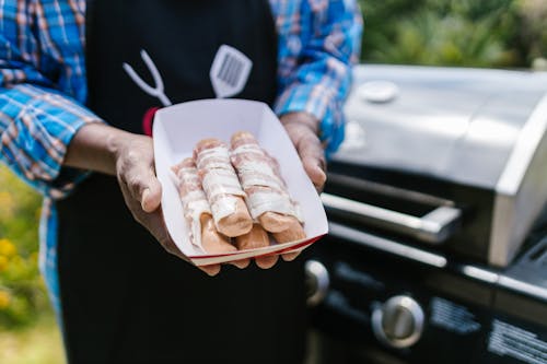 Free Hotdogs Wrapped in Bacon Stock Photo