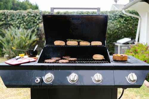 Free Cooking Burgers on the Grill Stock Photo