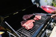 A Raw Meat on a Griller