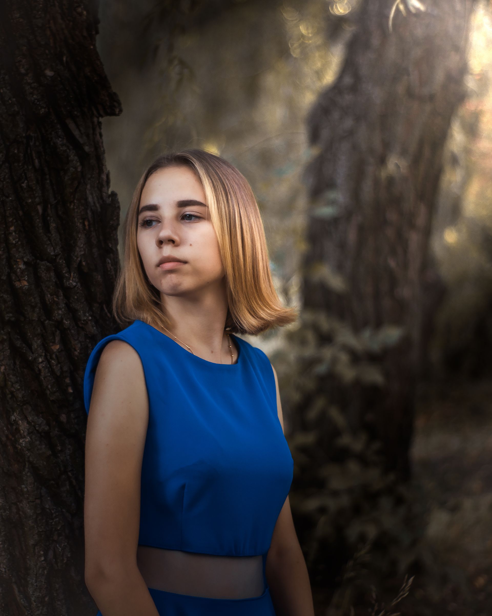 Girl Sitting Under A Tree Free Stock Photo
