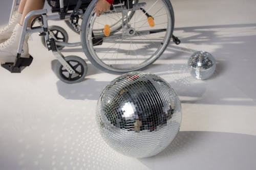 Free Silver Ball on White Surface Stock Photo