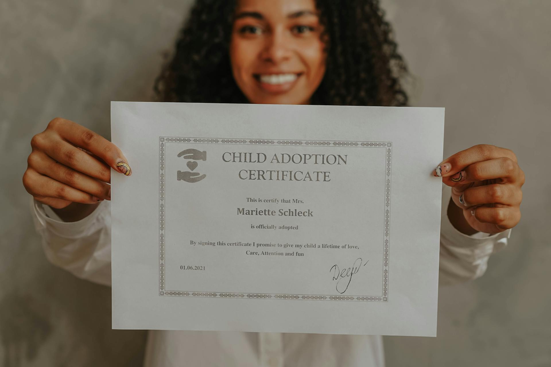 Close-Up Shot of a Woman Holding a Document