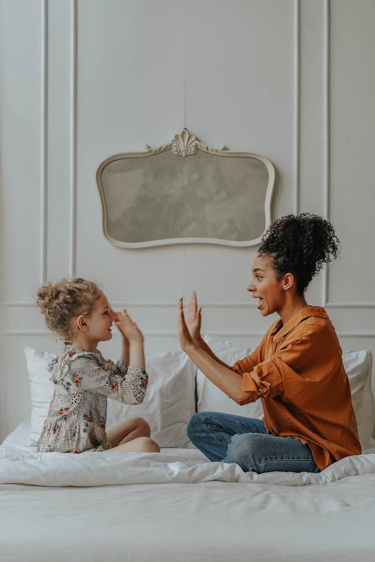 A Mother Playing With Her Daughter