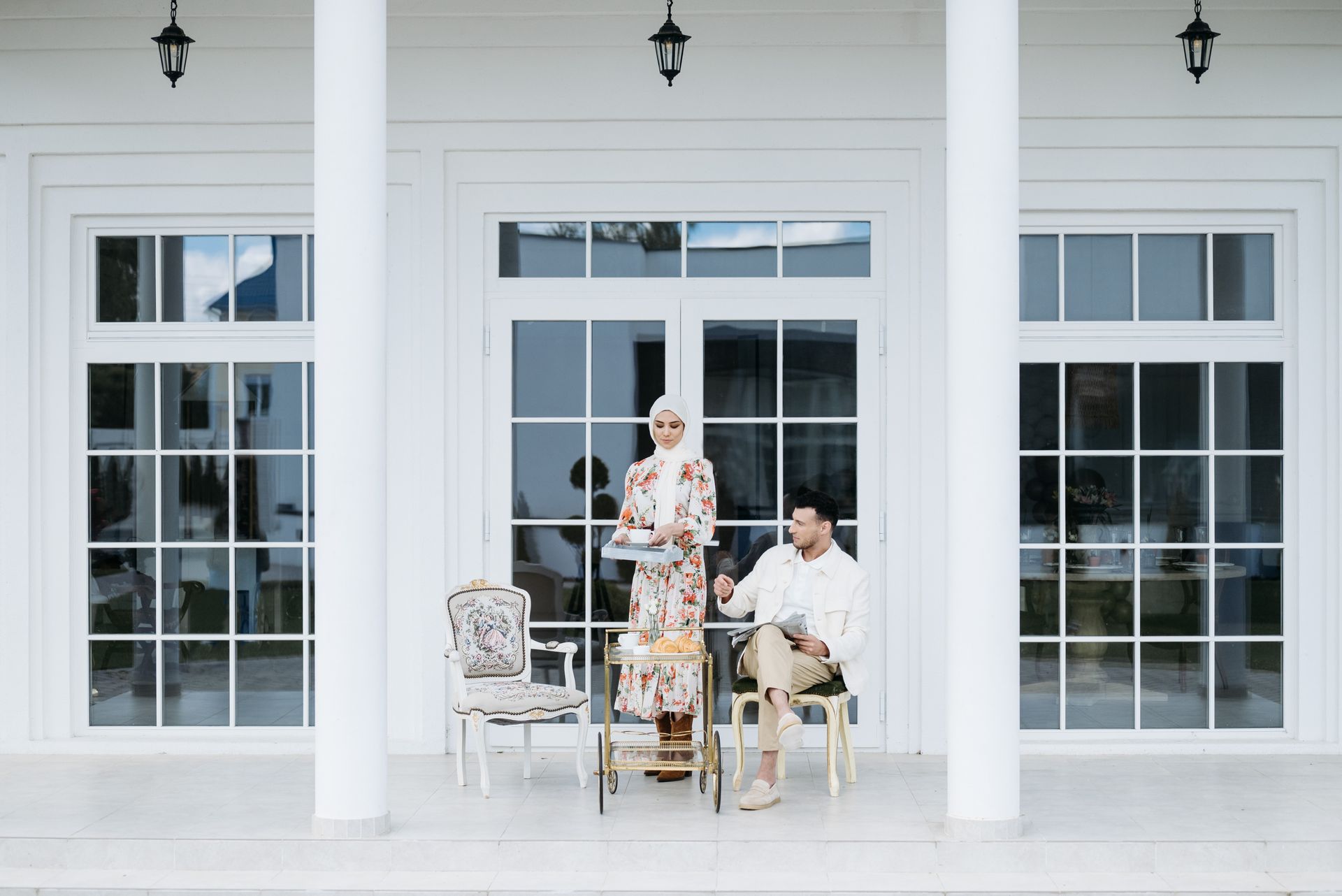 Couple on a Terrace in Front of a Mansion