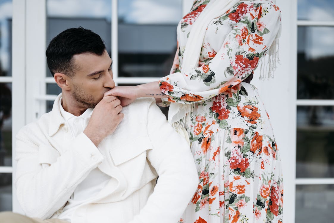 {{https://mixerdates.com/?ch=mixerblog}}man kissing woman's hand
