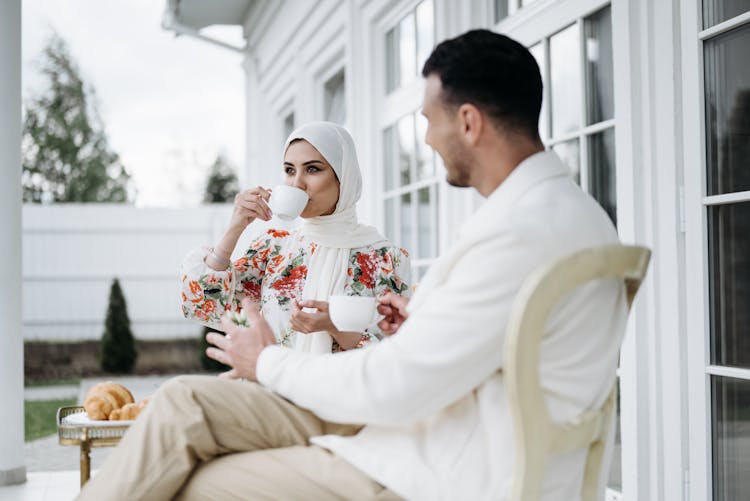 Man And Woman Drinking Tea Together 