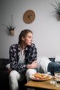 A Sad Woman Wearing a Plaid Shirt