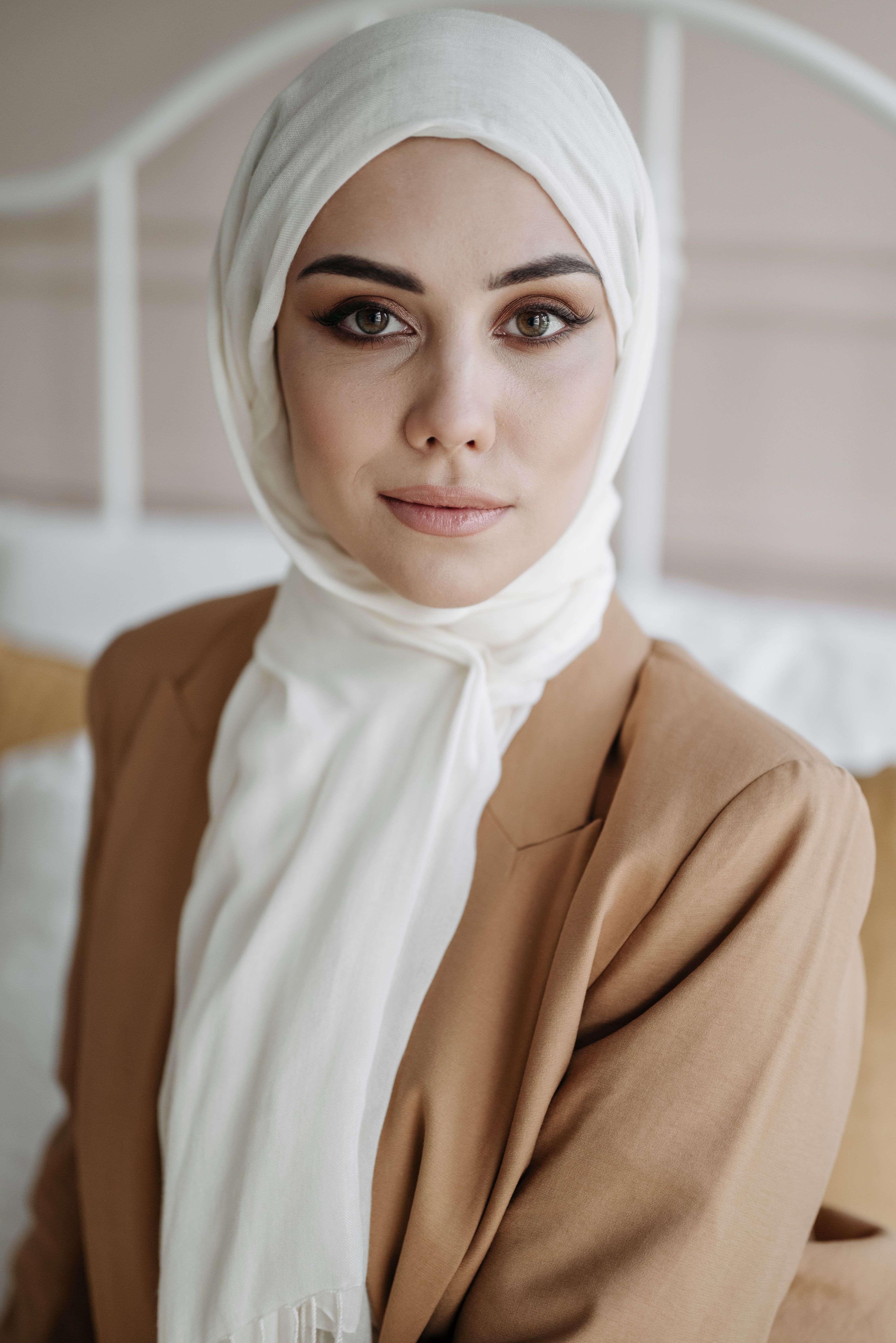 Woman in Brown Coat Wearing Hijab · Free Stock Photo