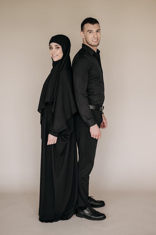 Man and Woman Wearing Black Clothes