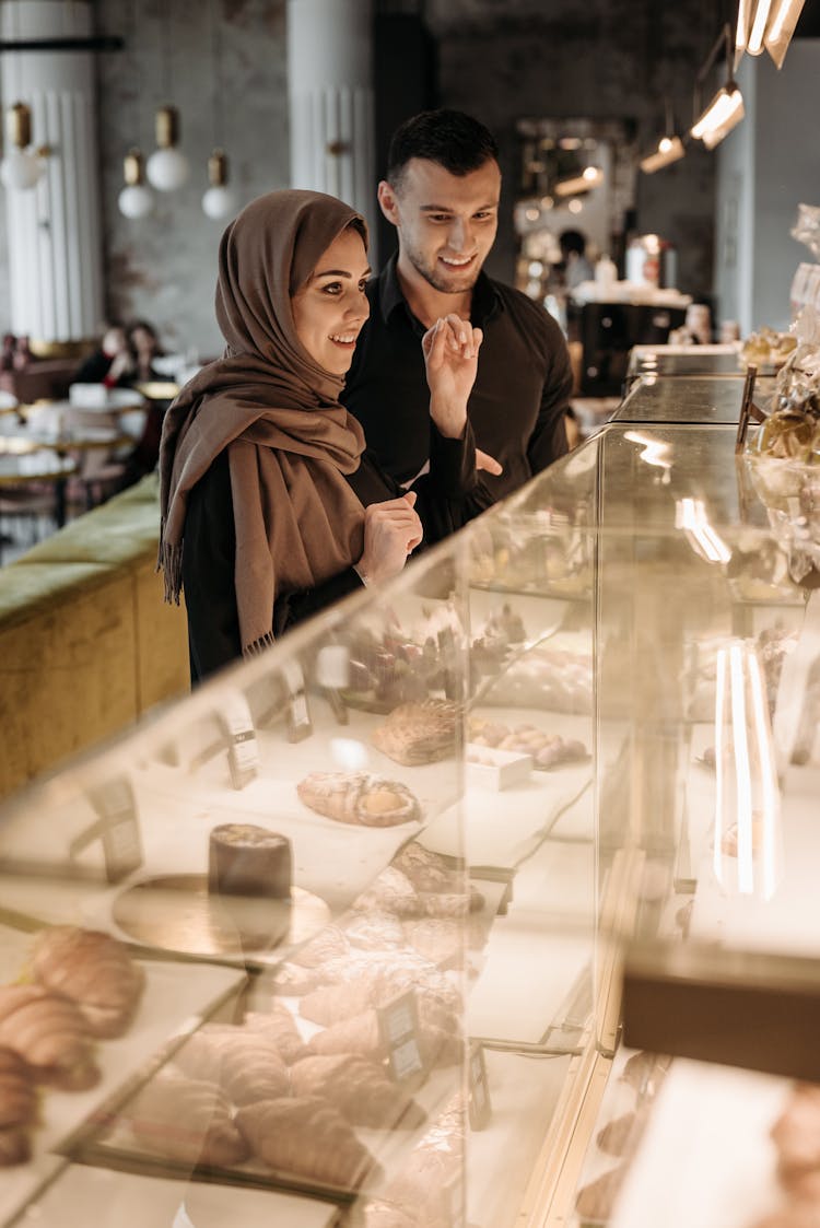 Man And Woman At A Bakery