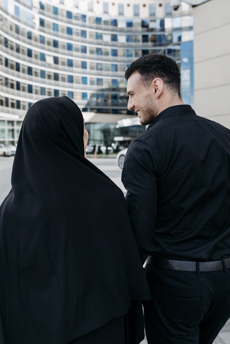 Man And Woman Wearing Black Clothes